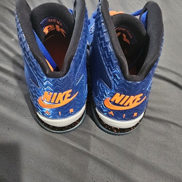 Blue and orange Spike Lee Jordans